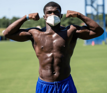 Muscle man with mask